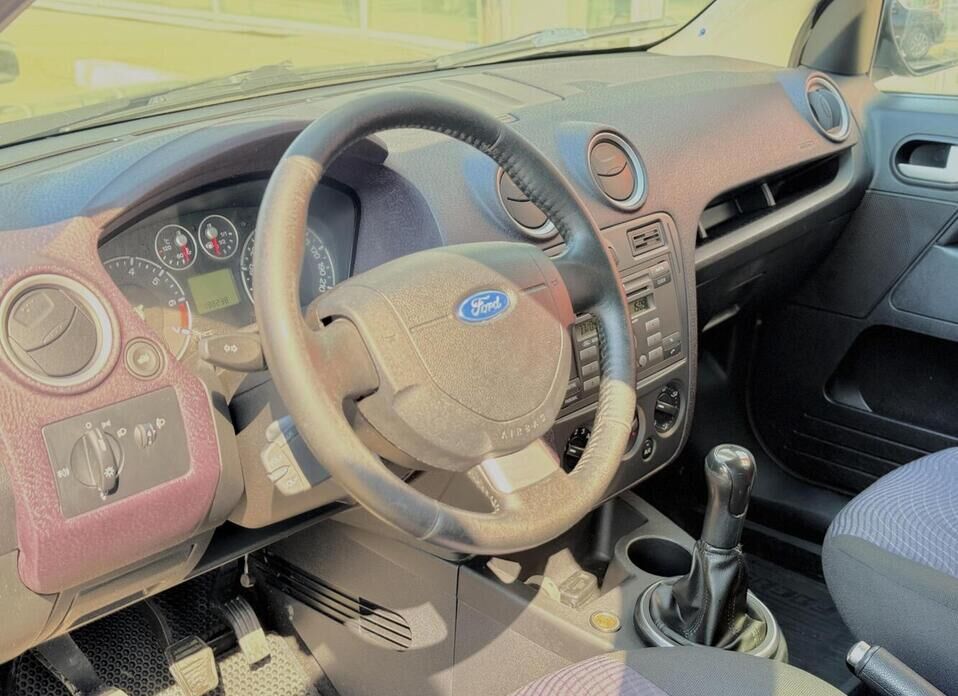 Ford Fusion, I Рестайлинг 1.4 MT (80 л.с.)