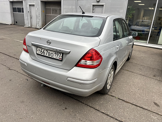 Nissan Tiida, 2010 г., 216 634 км