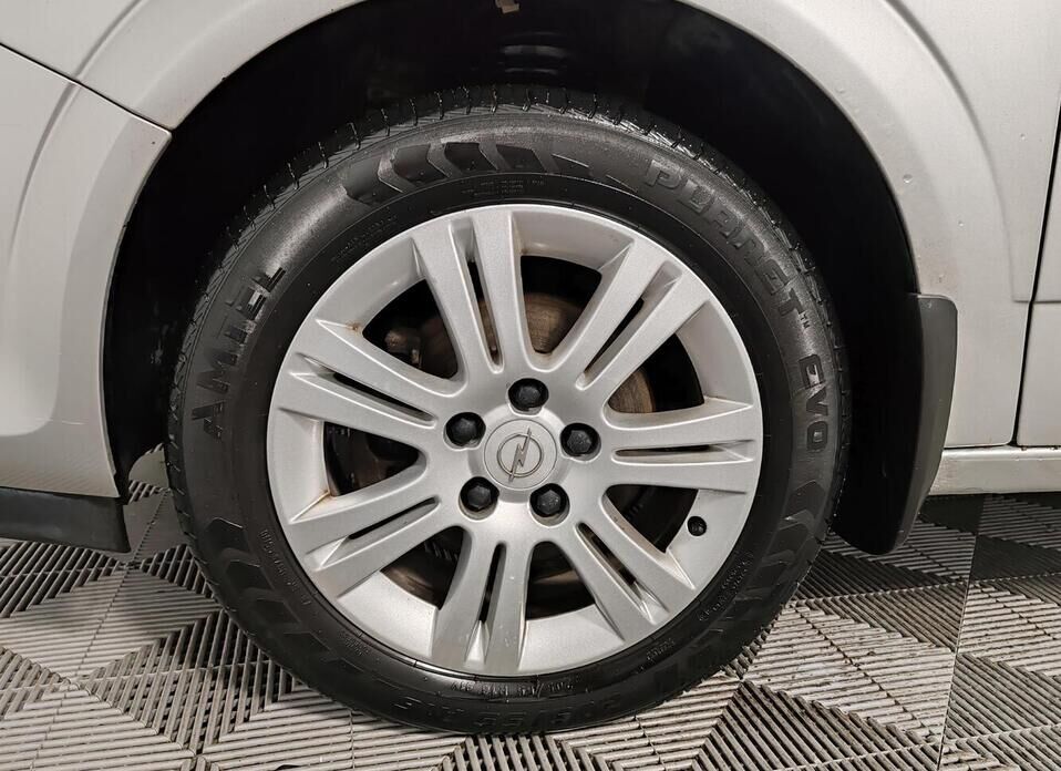 Opel Astra 1.8 AT (140 л.с.)