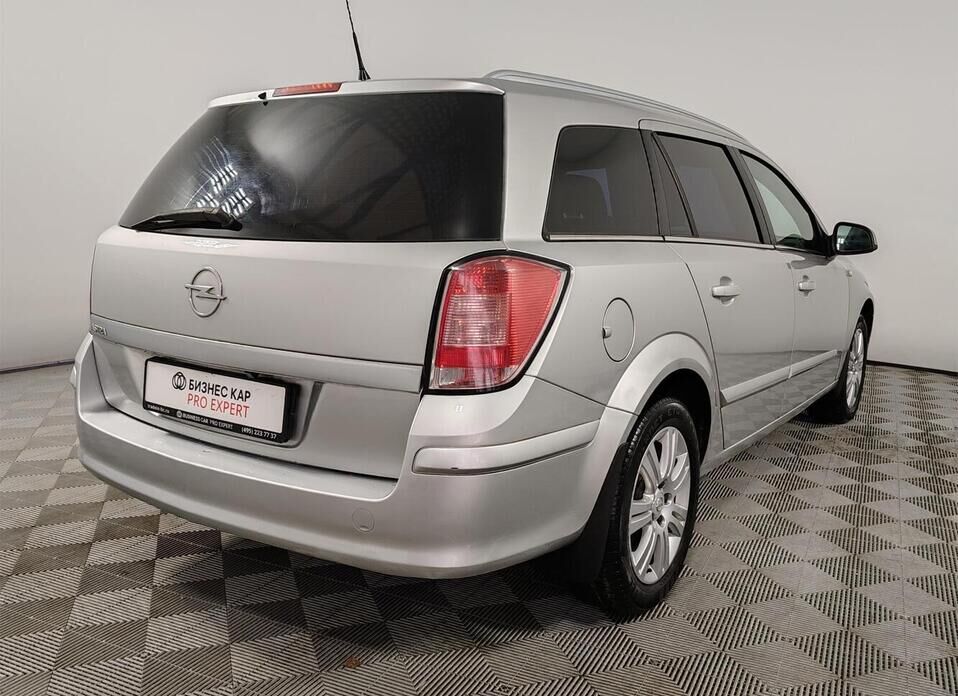 Opel Astra 1.8 AT (140 л.с.)