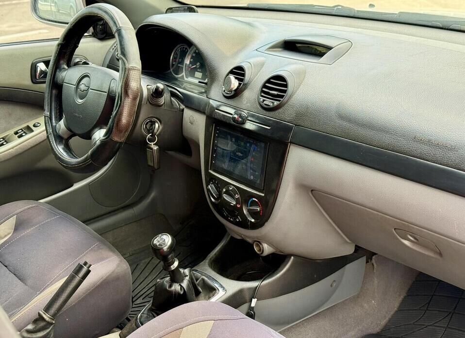 Chevrolet Lacetti, I 1.6 MT (109 л.с.)