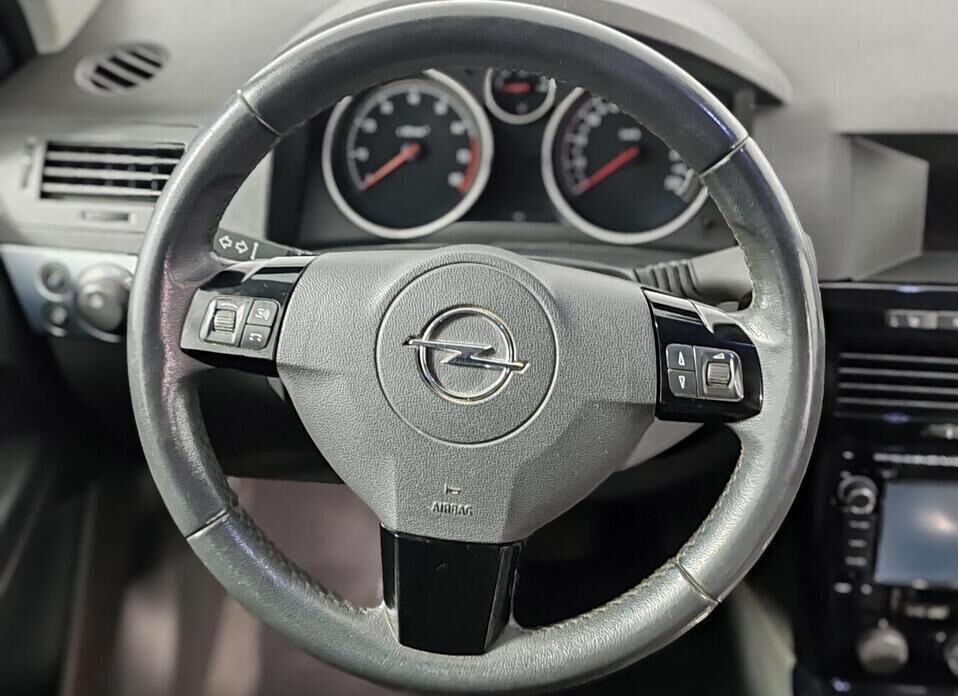 Opel Astra 1.8 AT (140 л.с.)