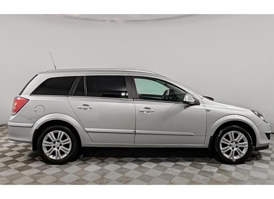 Opel Astra 1.8 AT (140 л.с.)