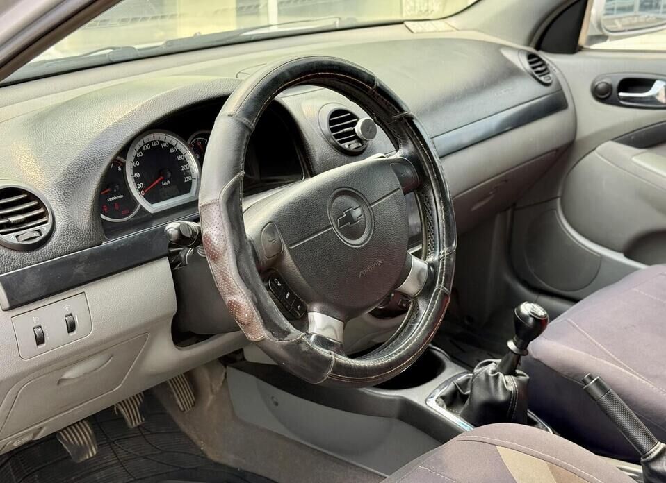 Chevrolet Lacetti, I 1.6 MT (109 л.с.)