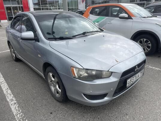 Mitsubishi Lancer, 2010 г., 252 639 км