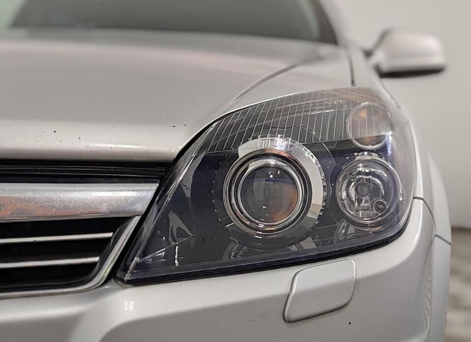 Opel Astra 1.8 AT (140 л.с.)