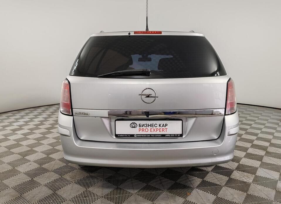 Opel Astra 1.8 AT (140 л.с.)