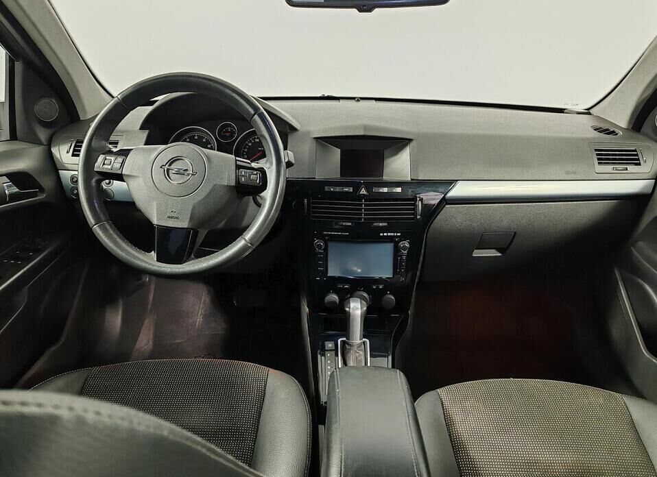 Opel Astra 1.8 AT (140 л.с.)