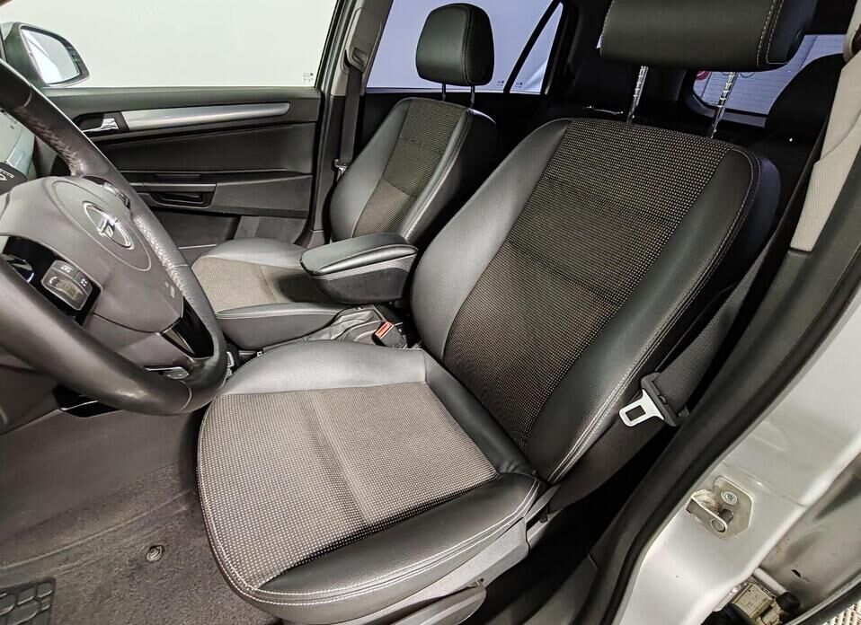 Opel Astra 1.8 AT (140 л.с.)