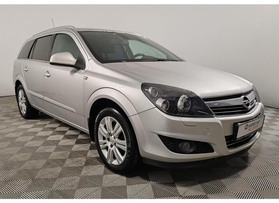 Opel Astra 1.8 AT (140 л.с.)