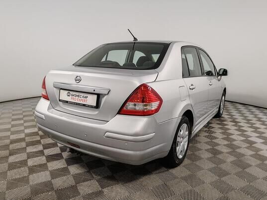 Nissan Tiida, 2010 г., 216 634 км