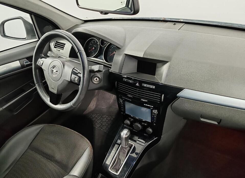 Opel Astra 1.8 AT (140 л.с.)